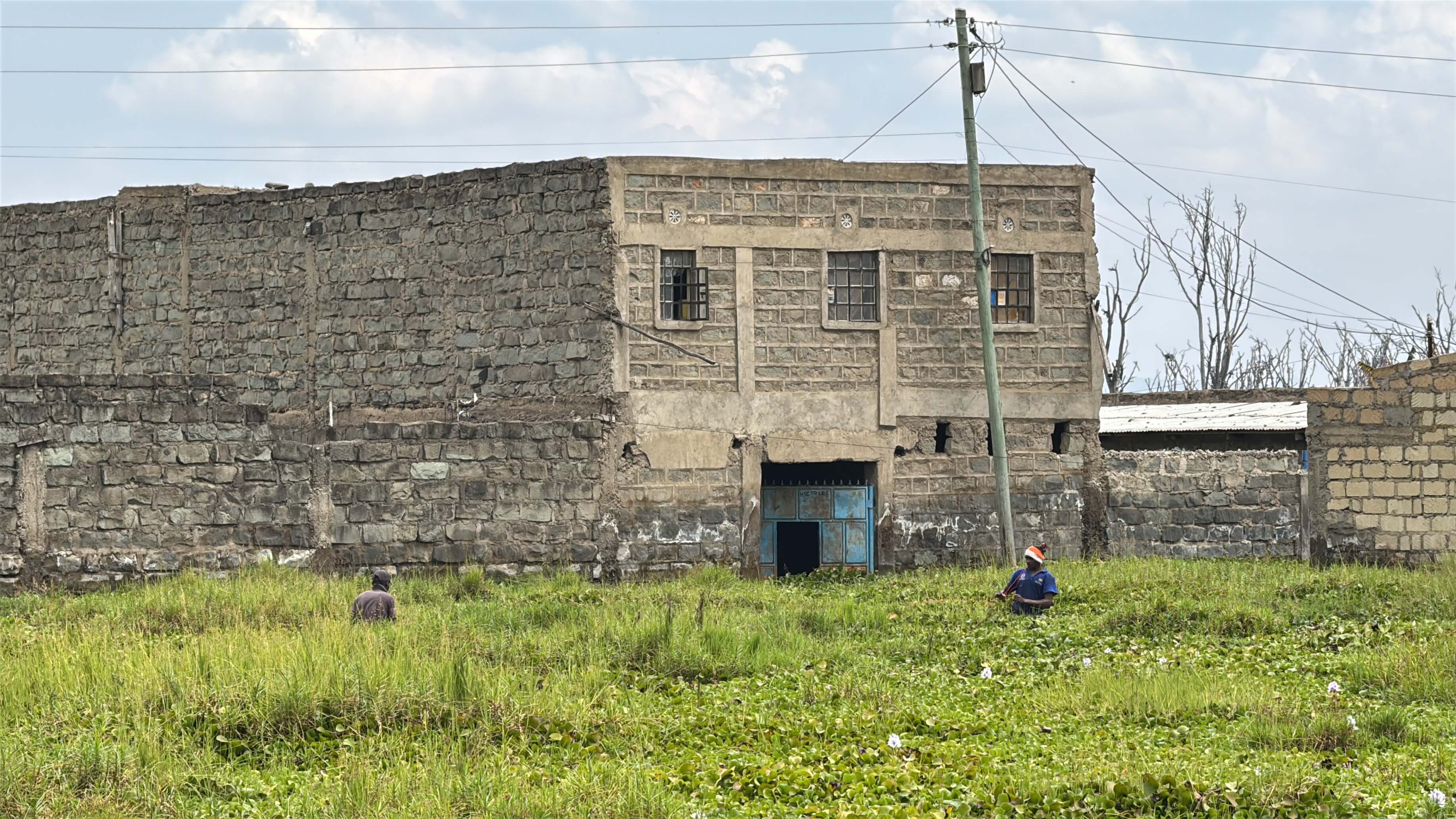 Residents of Kihoto, Naivasha outside a submerged plot on July 13,2026